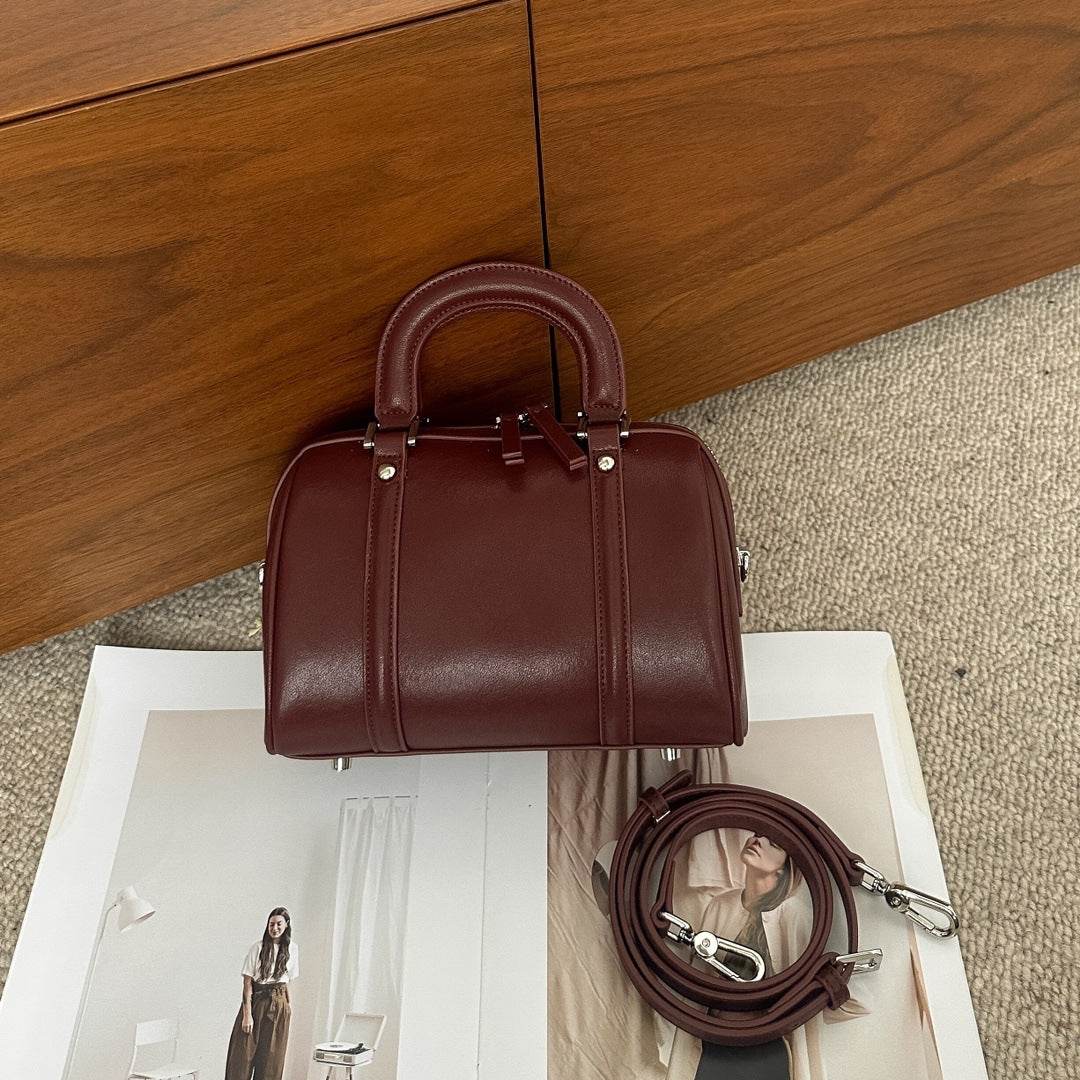 Versatile Cylindrical Genuine Leather Portable Crossbody Bag - Velora
