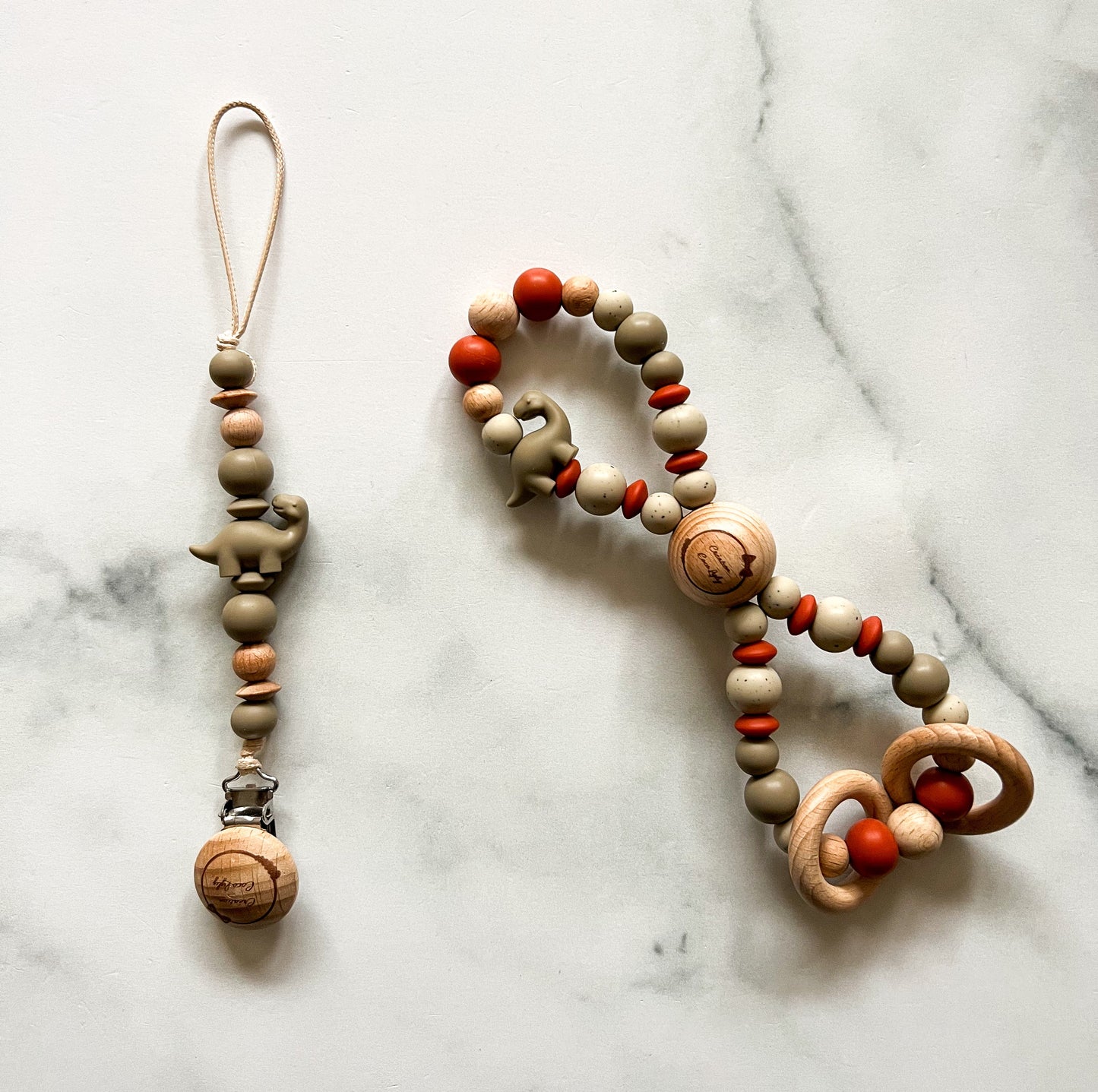 Duo attache-suce et hochet infini dino (voir description)