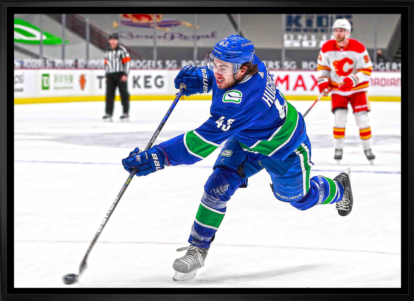 Quinn Hughes Vancouver Canucks Framed 20x29 Shooting Canvas - Velora