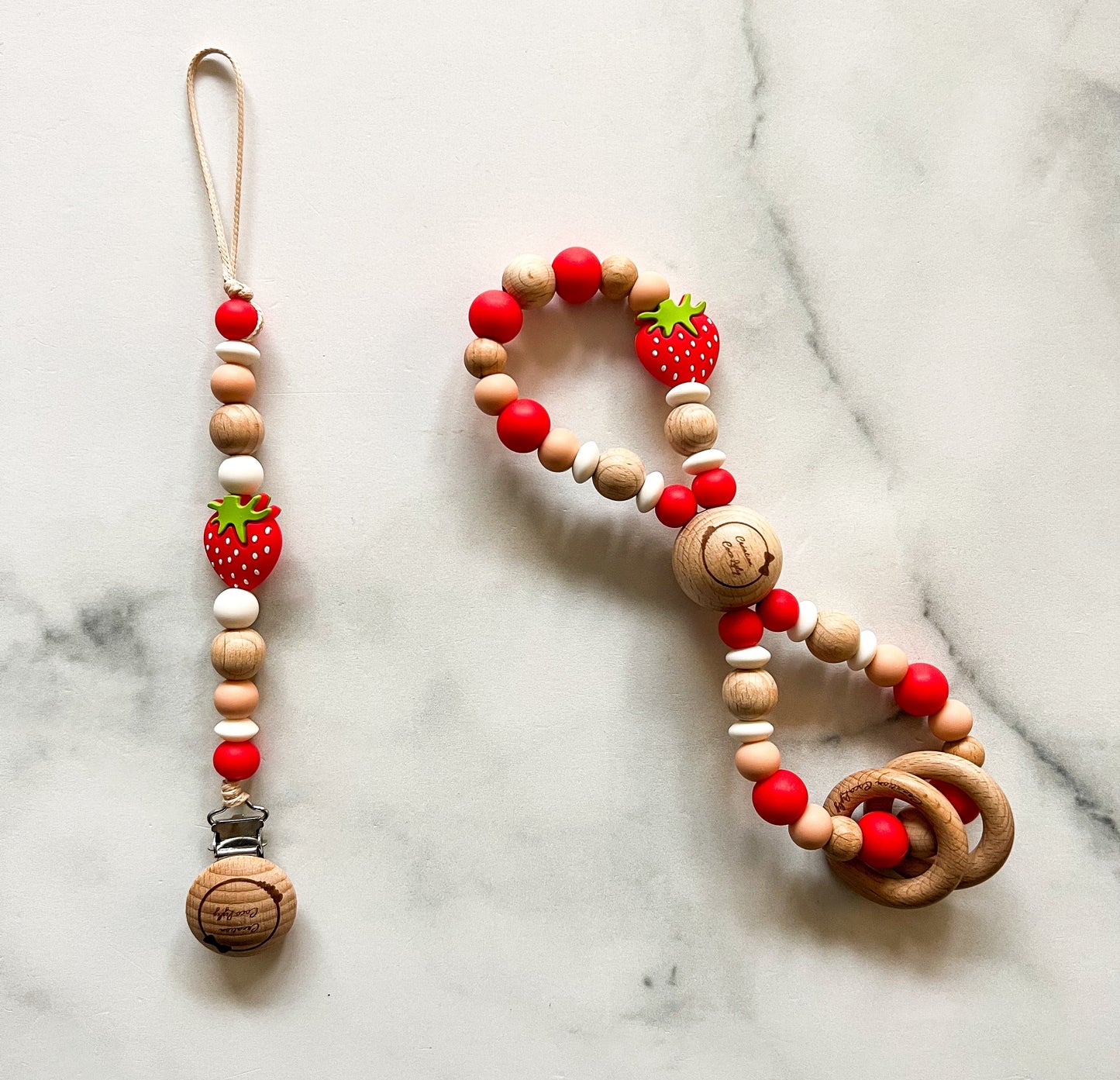 Duo attache-suce et hochet infini fraise (voir description)