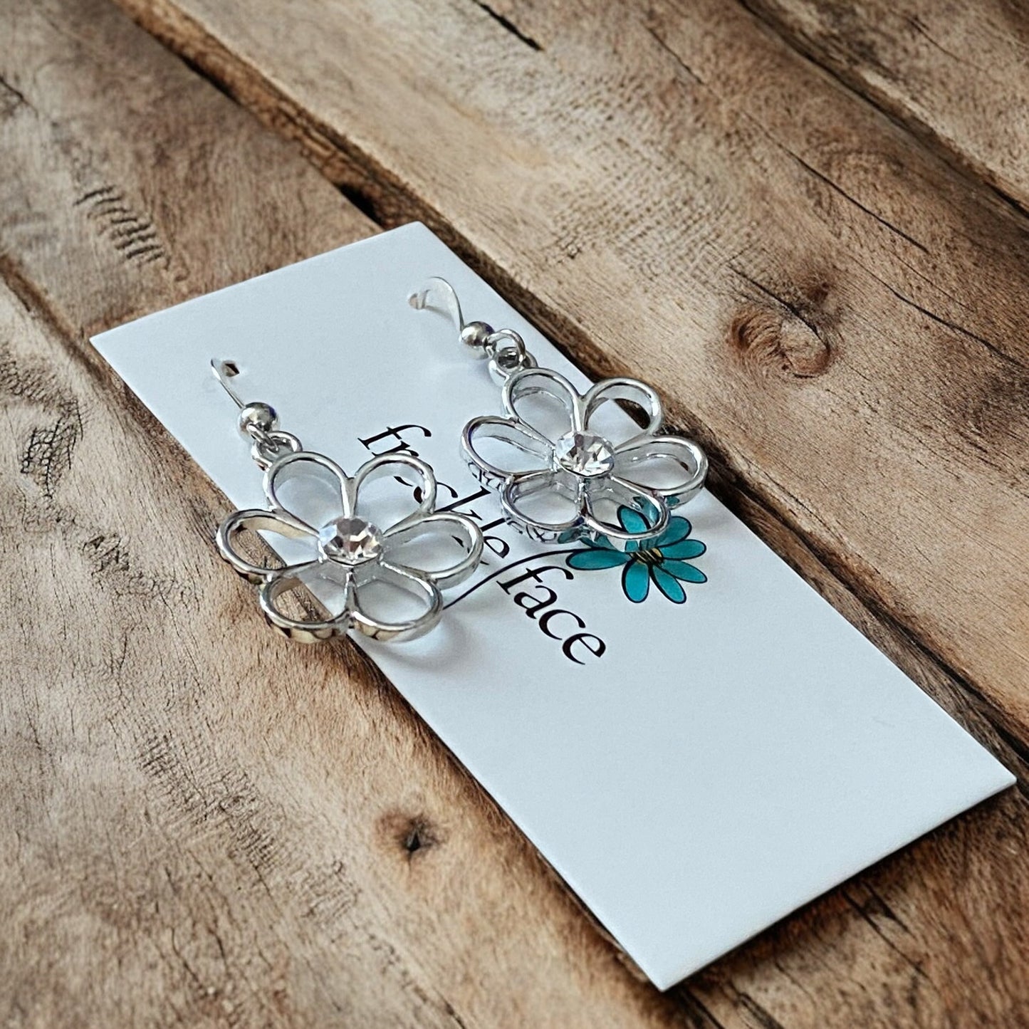 Cutie Patootie Flower Earrings – Silver Floral Dangles with Rhinestone Center - Velora
