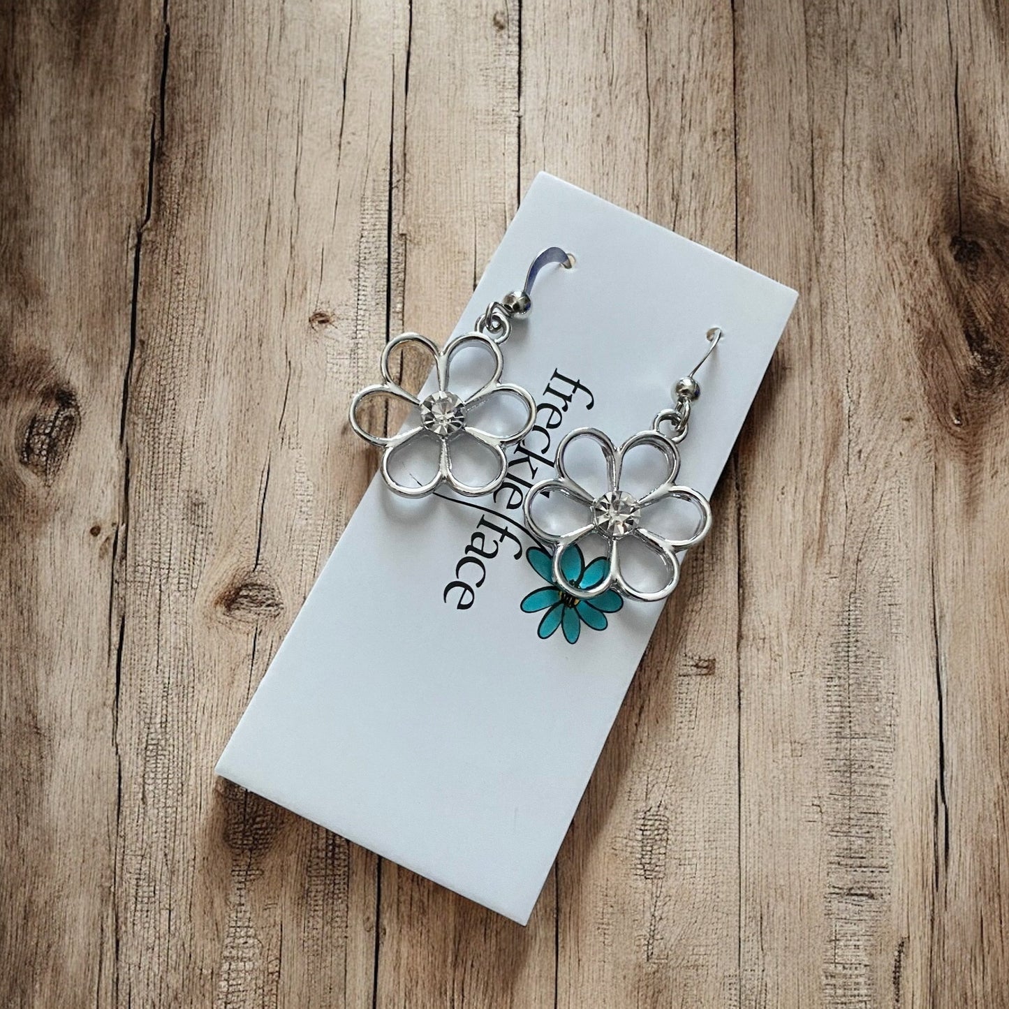 Cutie Patootie Flower Earrings – Silver Floral Dangles with Rhinestone Center - Velora
