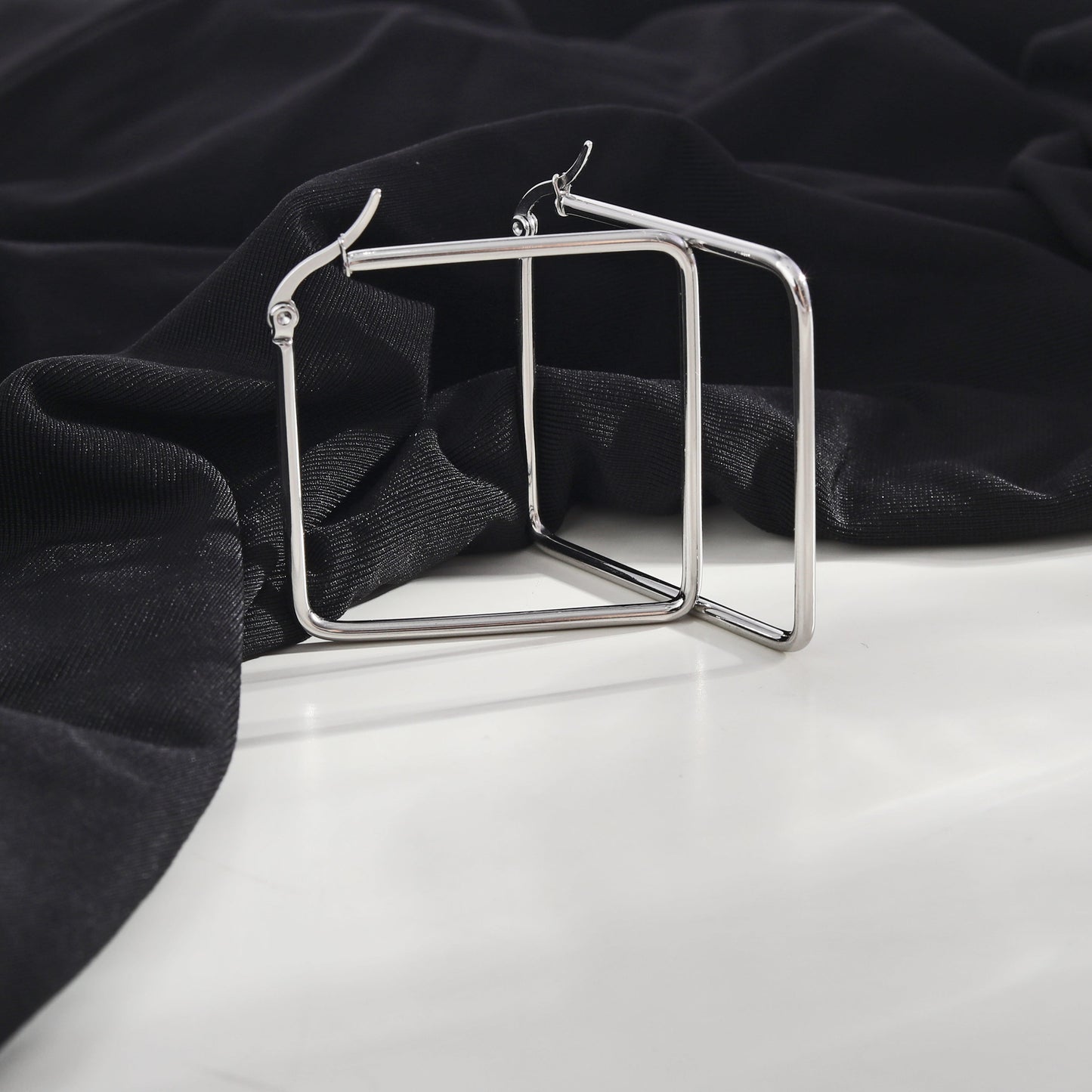 REILYNN: Square Silver Hoops - A Bold Twist on Classic Elegance - Velora