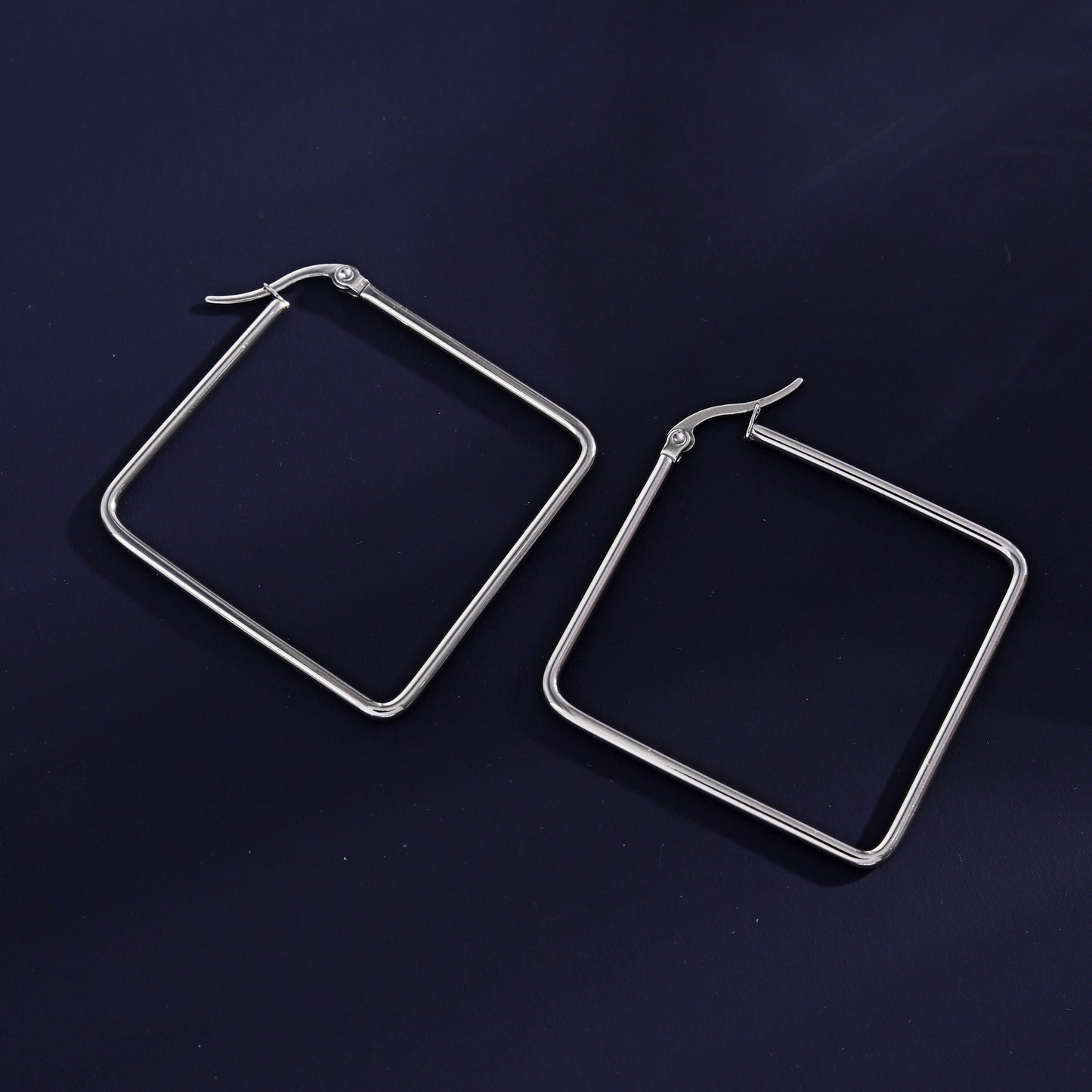 REILYNN: Square Silver Hoops - A Bold Twist on Classic Elegance - Velora