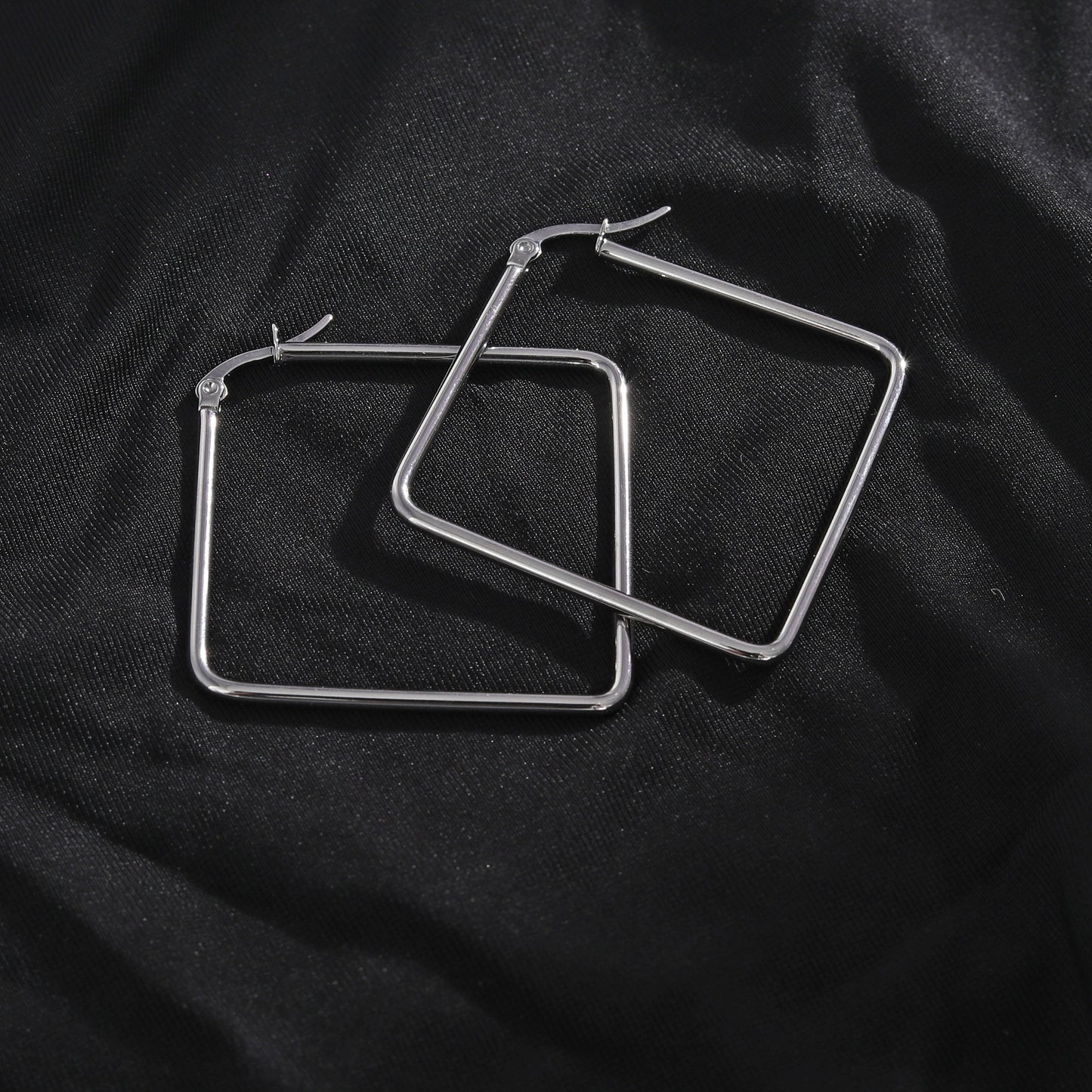 REILYNN: Square Silver Hoops - A Bold Twist on Classic Elegance - Velora