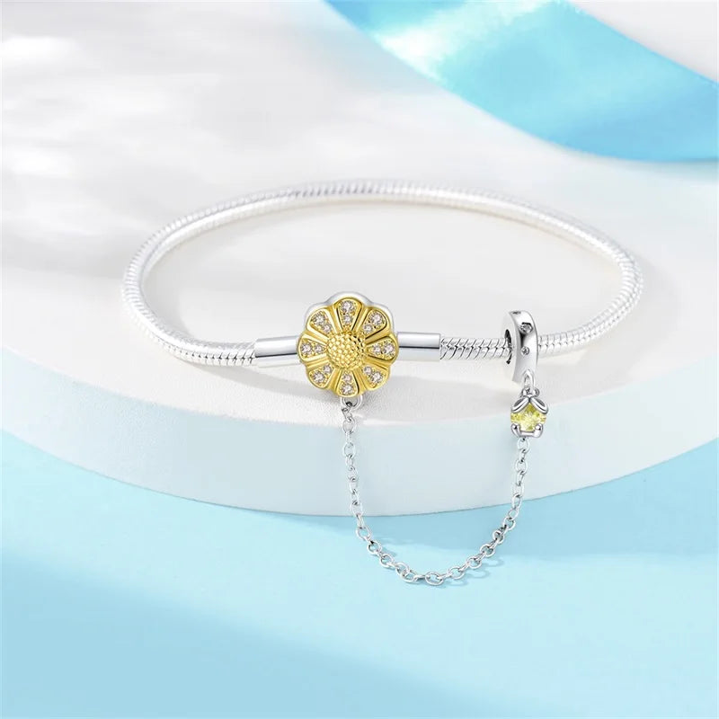 Radiant Daisy Sterling Silver Charm Bracelet With Dangling Chain - Velora