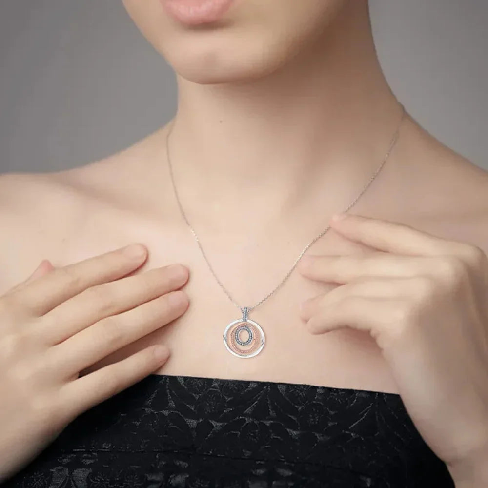 Radiate Timeless Elegance: Round CZ Pendant Necklace (925 Sterling Silver) - Velora