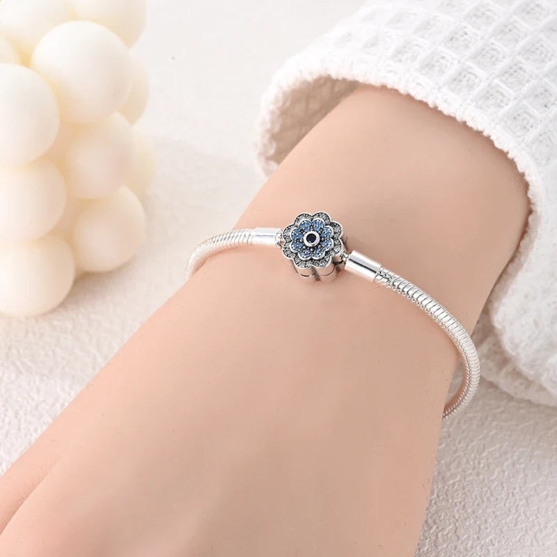 Radiant Blue Flower Clasp Sterling Silver Bracelet - Velora