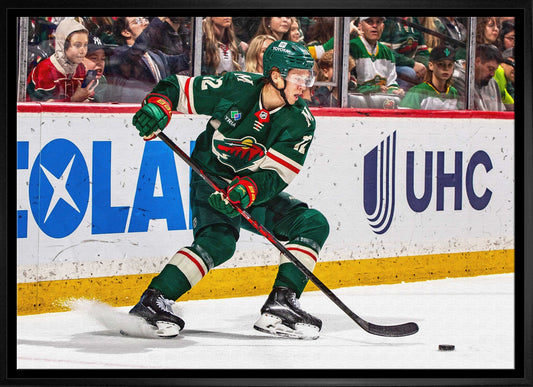 Matt Boldy 20x29 Framed Canvas Wild Skating-H Frameworth Sports Marketing