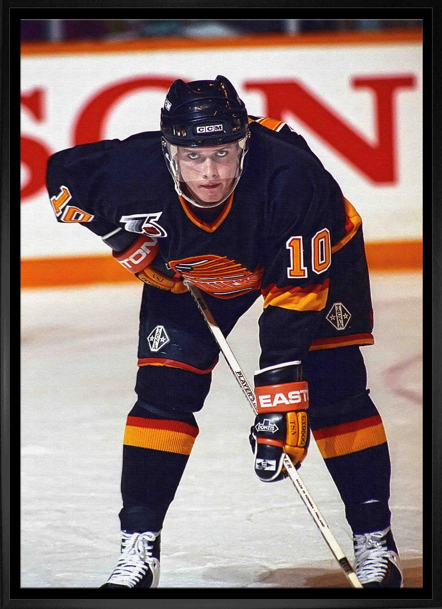 Pavel Bure 20x29 Framed Canvas Canucks Face-Off-V Frameworth Sports Marketing