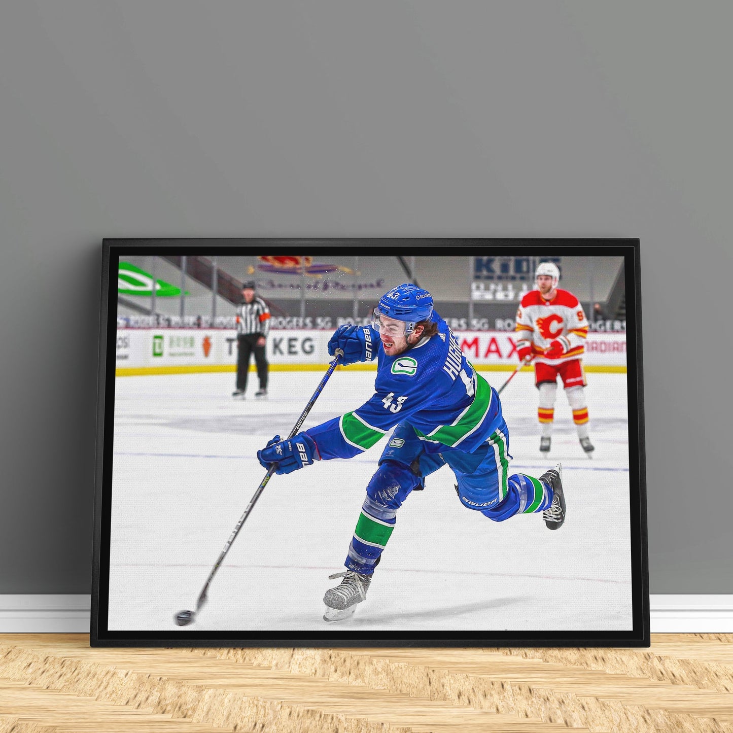 Quinn Hughes Vancouver Canucks Framed 20x29 Shooting Canvas Frameworth Sports Marketing