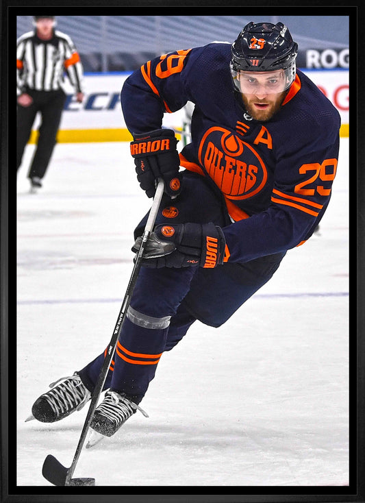 Leon Draisaitl Edmonton Oilers Framed 20x29 Skating with Puck Canvas Frameworth Sports Marketing