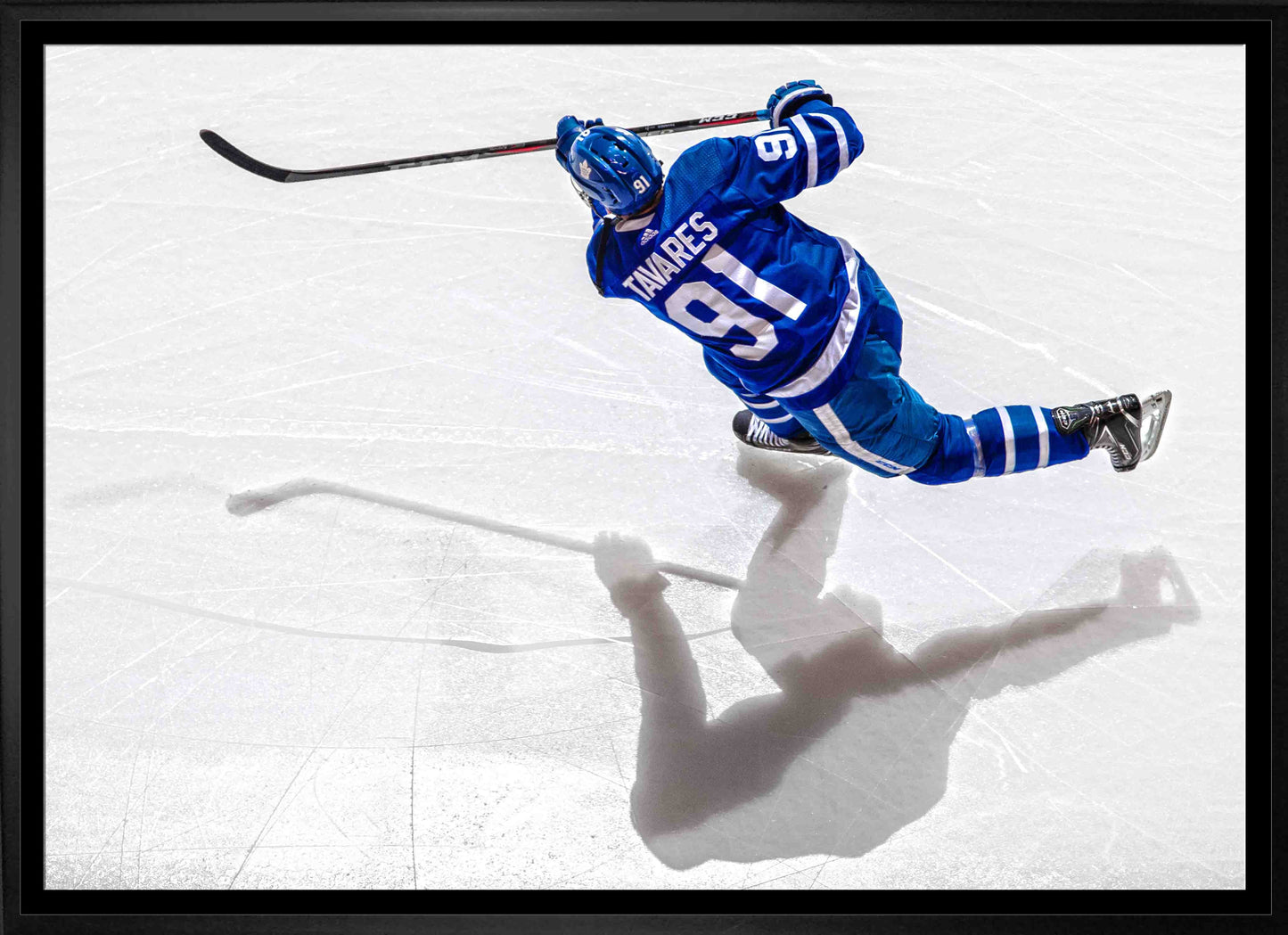 John Tavares Toronto Maple Leafs Framed 20x29 Shooting Canvas Frameworth Sports Marketing