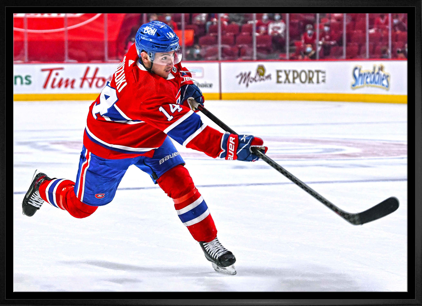 Nick Suzuki Montreal Canadiens Framed 20x29 Shooting Follow Through Canvas Frameworth Sports Marketing