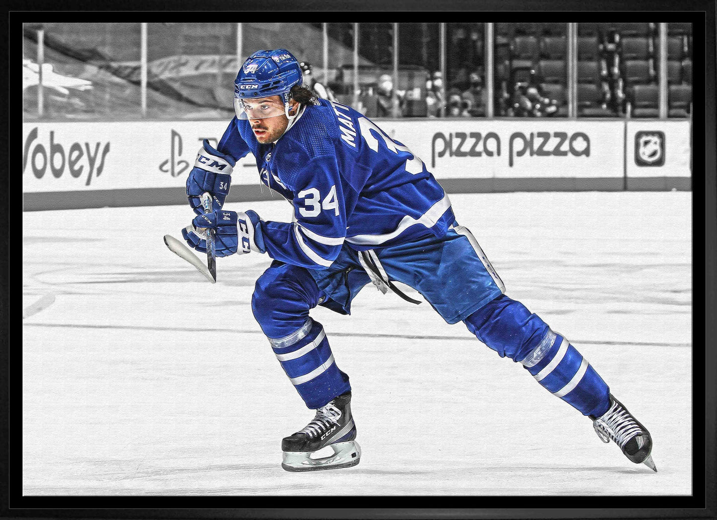 Auston Matthews Toronto Maple Leafs Framed 20x29 Hustling Spotlight Canvas Frameworth Sports Marketing