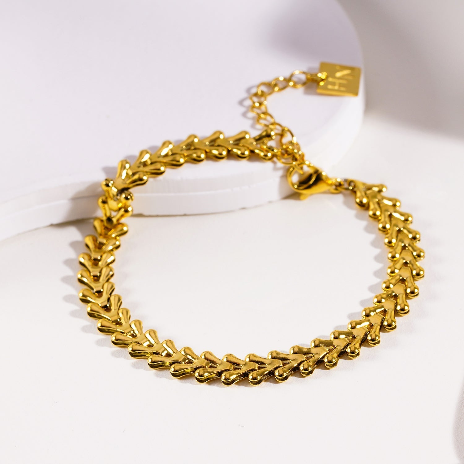 BLYTH:  Vintage-Inspired Linked Abstract Crest Bracelet - Velora Luxury Fashion