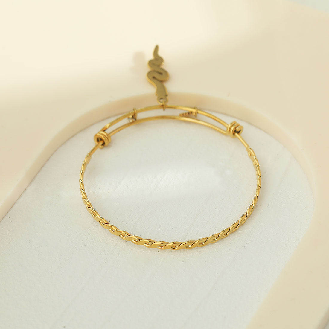 CATALINA Gold: Bracelet with Serpent, Sun Symbol and Zirconia (CZ) Charms - Velora Luxury Fashion