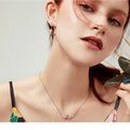 Delicate Beauty: Korean Style 925 Sterling Silver Butterfly and Flower Choker Necklace - Velora Luxury Fashion