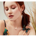 Delicate Beauty: Korean Style 925 Sterling Silver Butterfly and Flower Choker Necklace - Velora Luxury Fashion