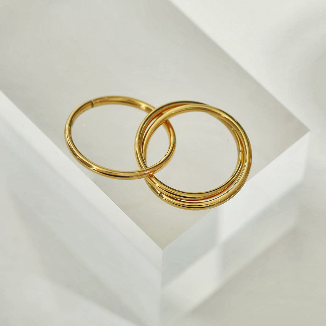 ESTELLA: Triple Banded Interconnected Stack Ring in Gold - Velora Luxury Fashion