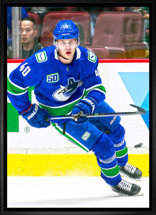 Elias Pettersson Vancouver Canucks Framed 20x29 Skating Canvas - Velora Luxury Fashion