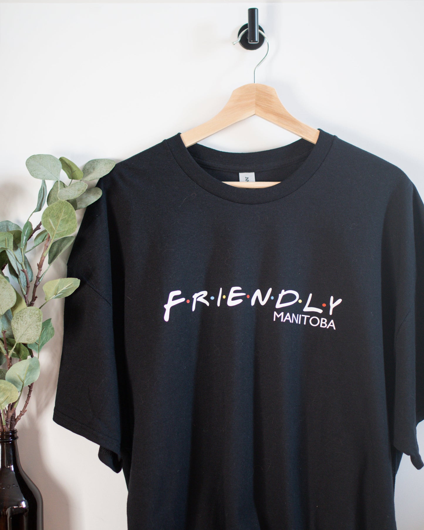 Friendly Manitoba Black T-shirt - Velora Luxury Fashion
