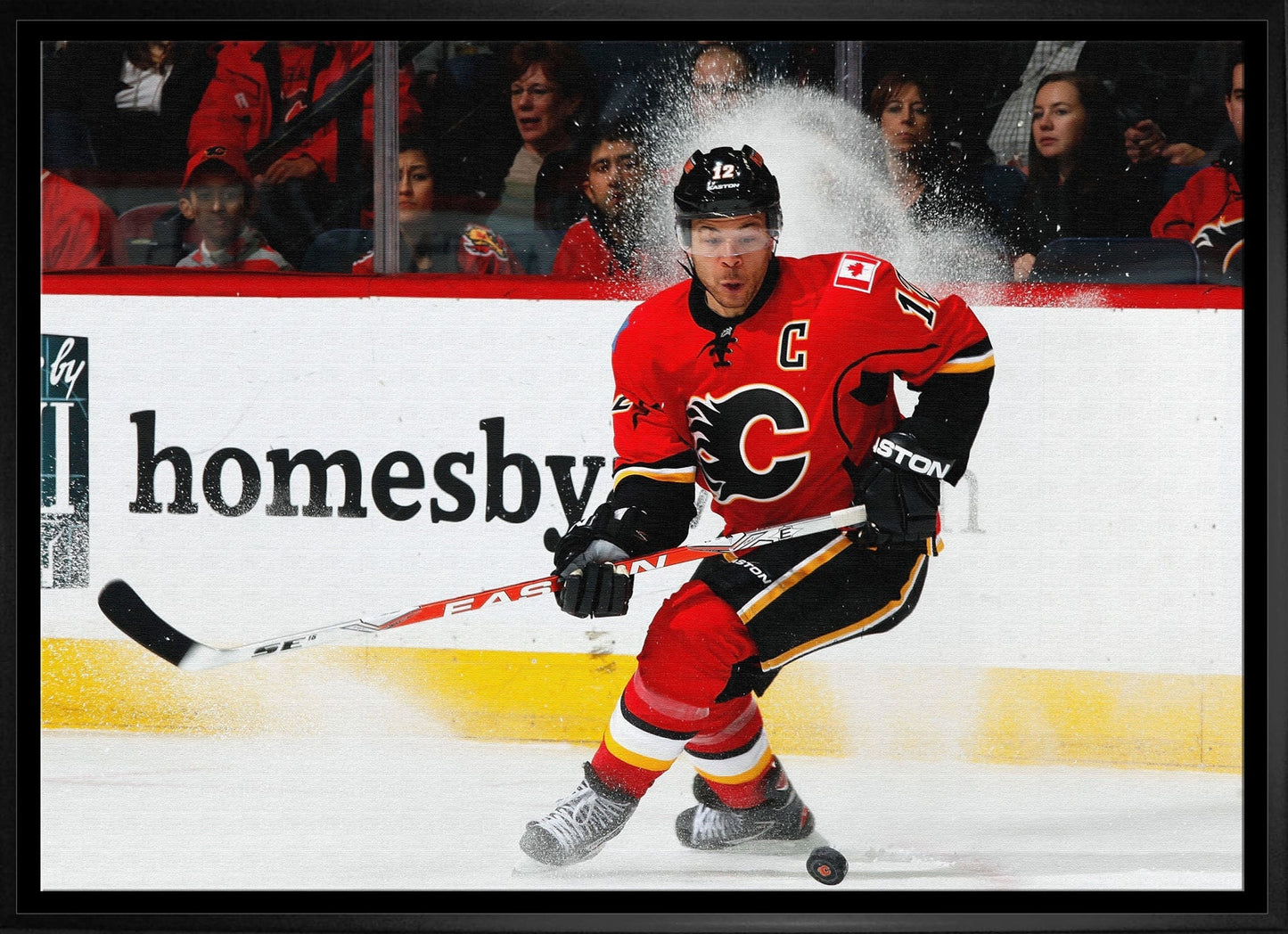 Jarome Iginla 20x29 Framed Canvas Flames Skating-H - Velora Luxury Fashion