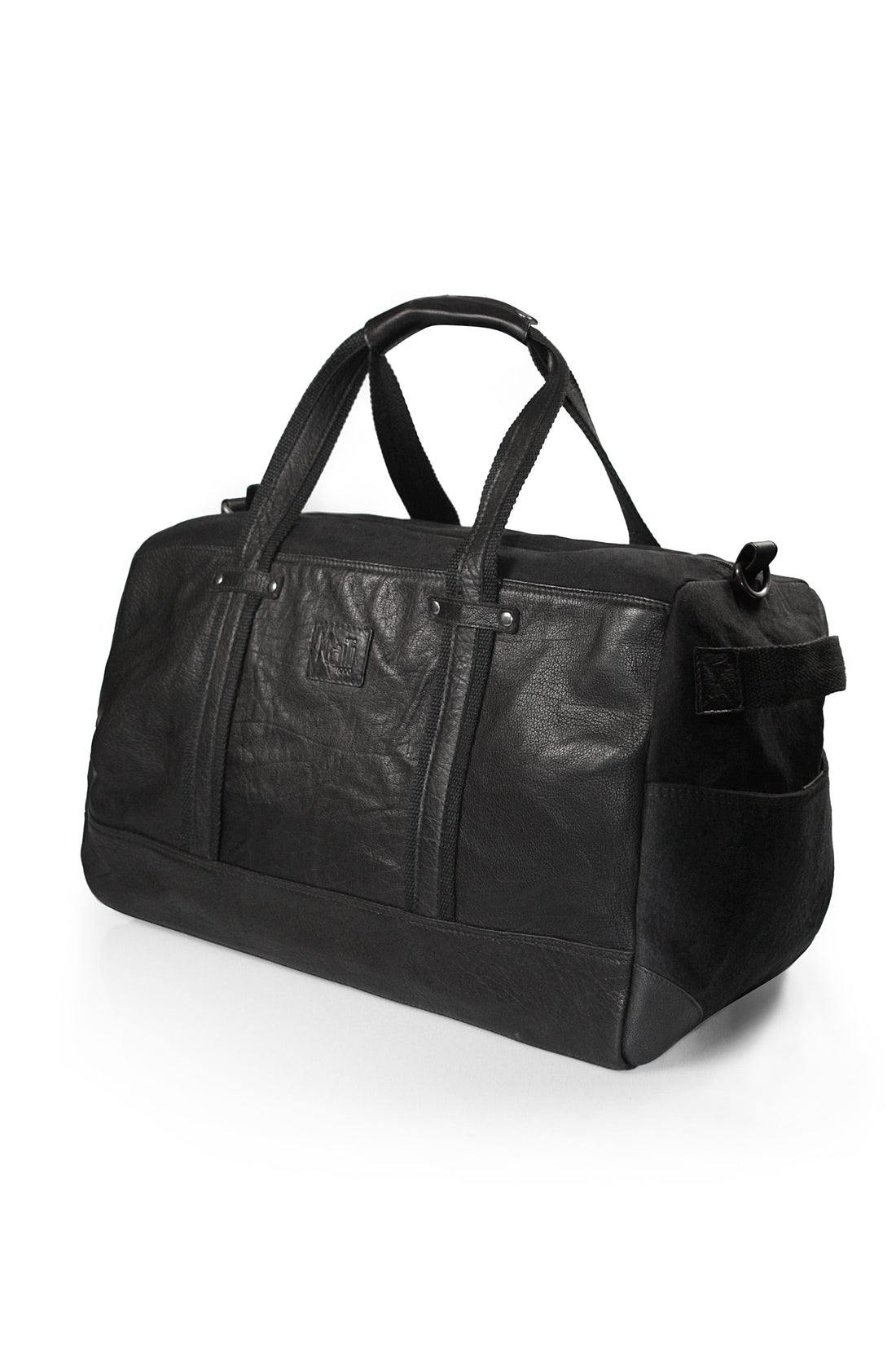 K0024AB | Borsone da Viaggio in Canvas/Vera Pelle, pieno fiore, volanata - Colore Nero. Accessori Nickel Anticato, Chiusura con lampo. Dimensioni: cm 48 x 31 x 22 - Confezione: Sacchetto Tnt - Velora Luxury Fashion