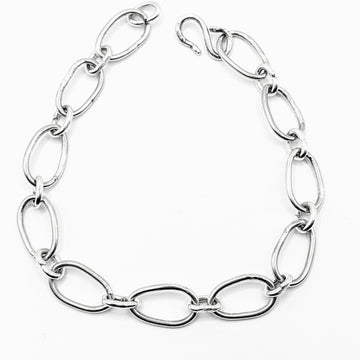 Radiant Linkage: Handcrafted Sterling Silver Oval Chain Bracelet