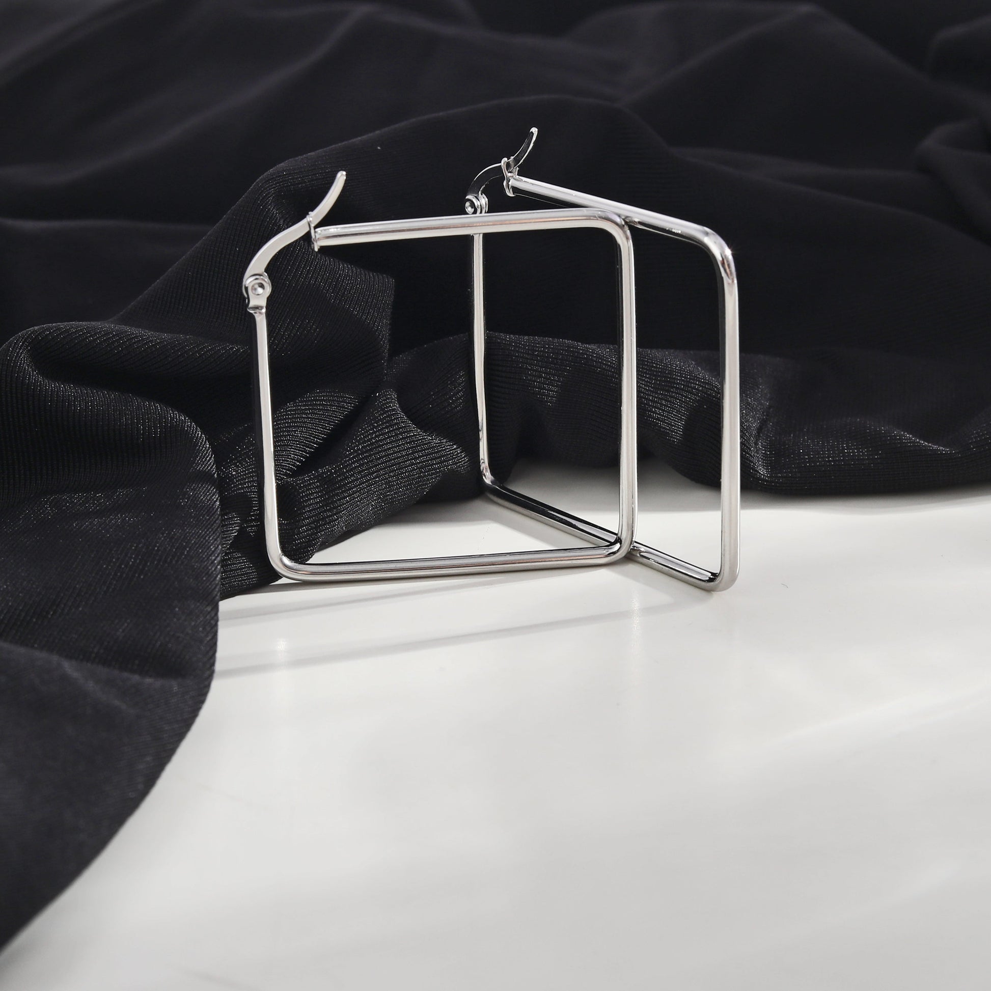 REILYNN: Square Silver Hoops - A Bold Twist on Classic Elegance - Velora
