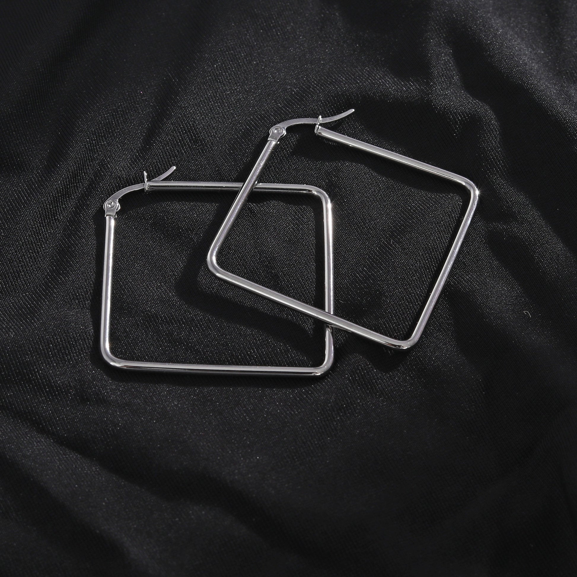 REILYNN: Square Silver Hoops - A Bold Twist on Classic Elegance - Velora