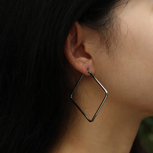 REILYNN: Square Silver Hoops - A Bold Twist on Classic Elegance - Velora