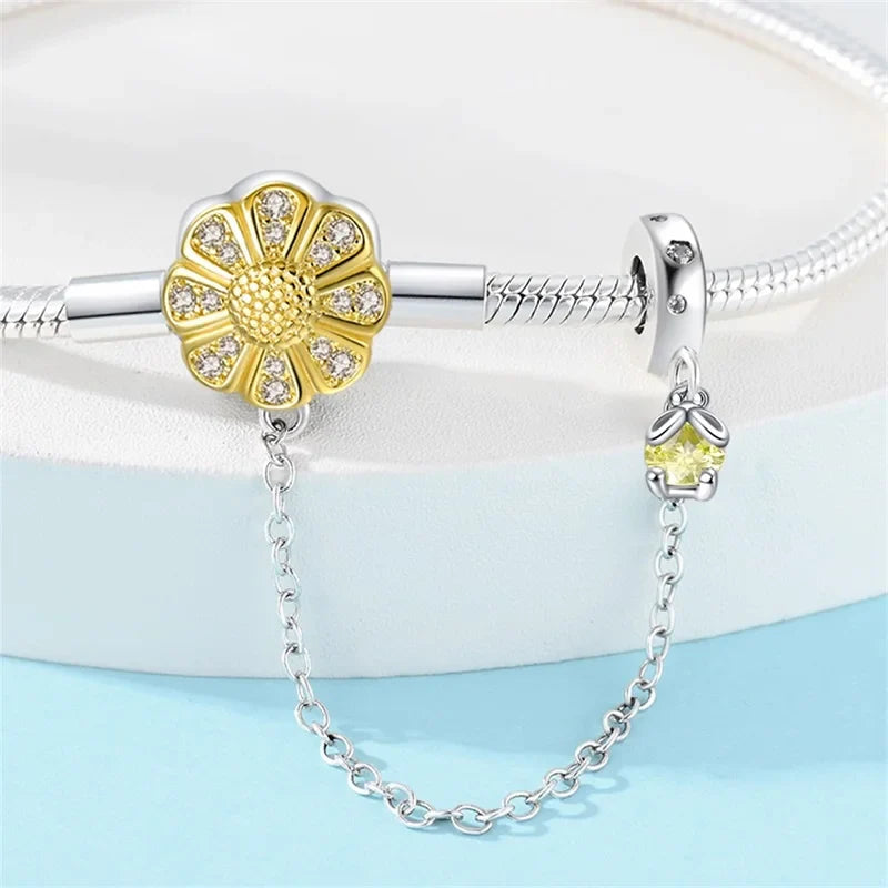 Radiant Daisy Sterling Silver Charm Bracelet With Dangling Chain - Velora