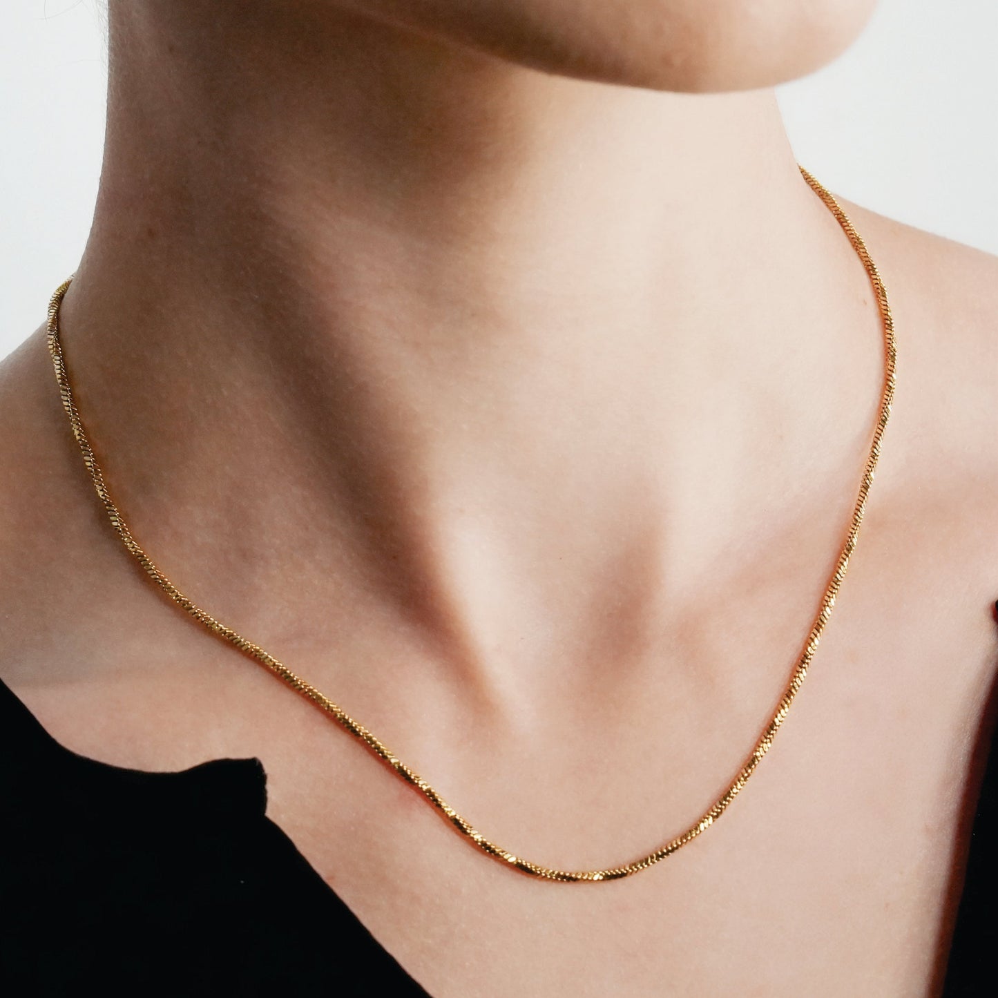 SKAGWAY: Minimalist Twisted Textures Chain Necklace in Gold - Velora Luxury Fashion