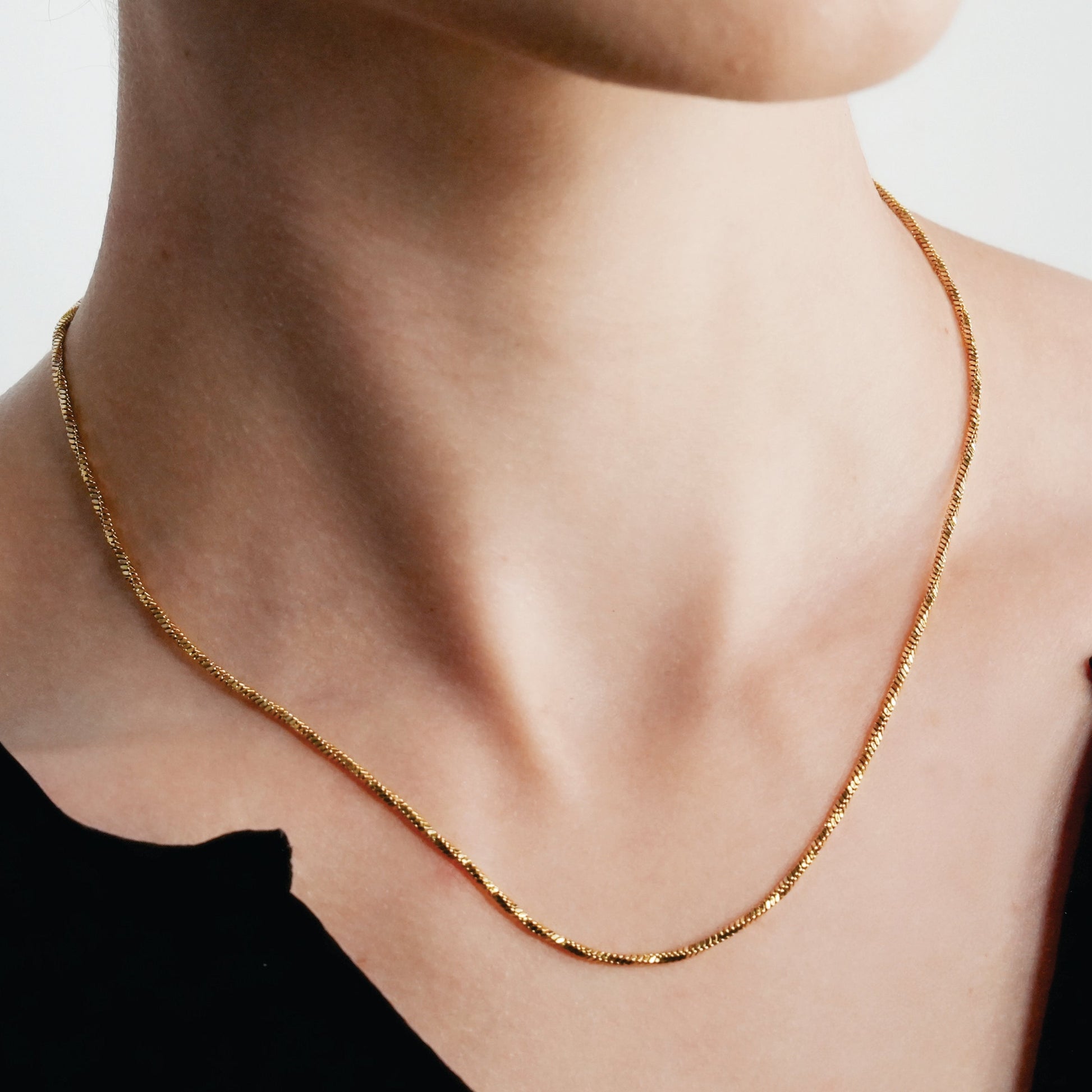 SKAGWAY: Minimalist Twisted Textures Chain Necklace in Gold - Velora Luxury Fashion
