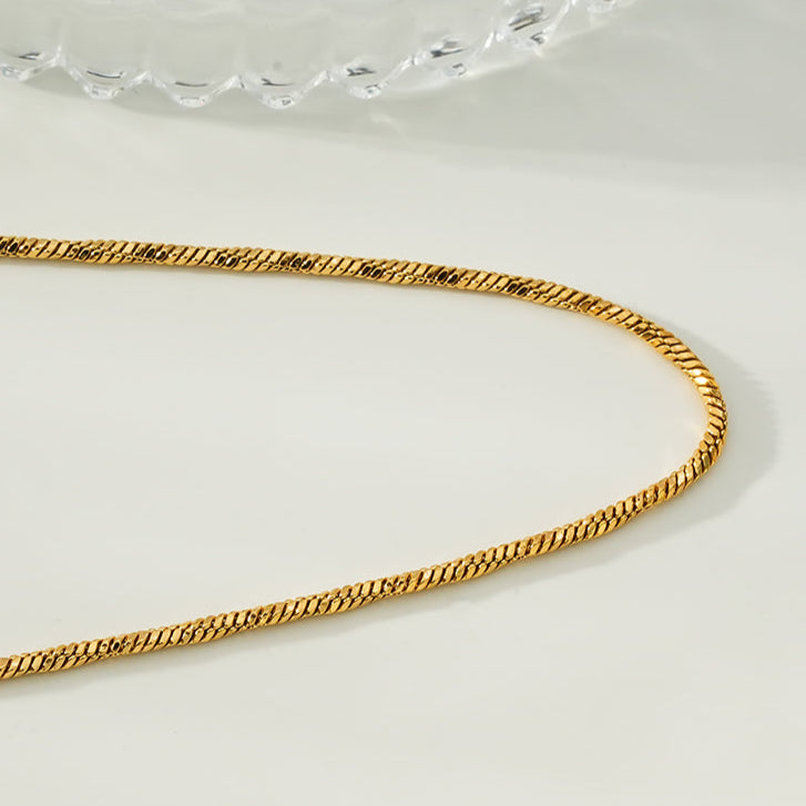 SKAGWAY: Minimalist Twisted Textures Chain Necklace in Gold - Velora Luxury Fashion