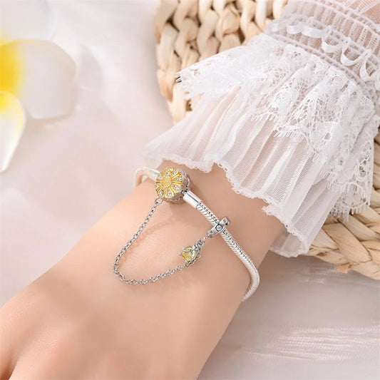 Radiant Daisy Sterling Silver Charm Bracelet With Dangling Chain - Velora