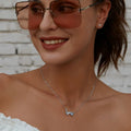 Soar with Style: Blue Zircon Korean Style Sterling Silver Butterfly Necklace - Velora Luxury Fashion