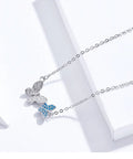 Soar with Style: Blue Zircon Korean Style Sterling Silver Butterfly Necklace - Velora Luxury Fashion
