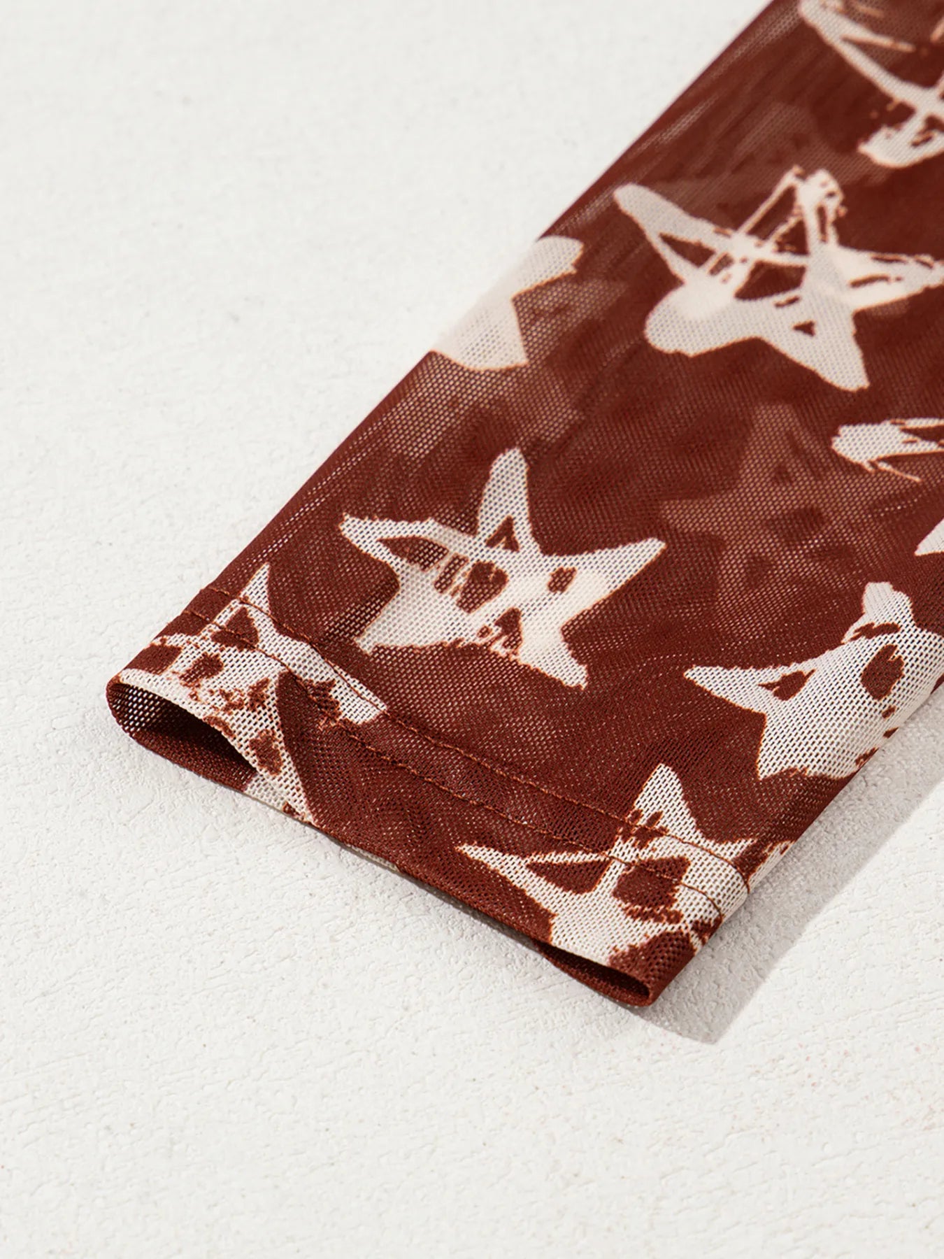 Star Print Long Sleeve Mock Neck Top - Velora Luxury Fashion