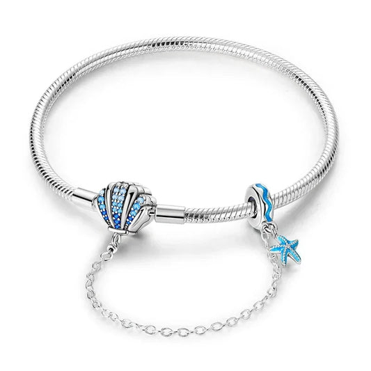 Sterling Silver Seashell Charm Bracelet with Blue CZ Gradient - Velora Luxury Fashion