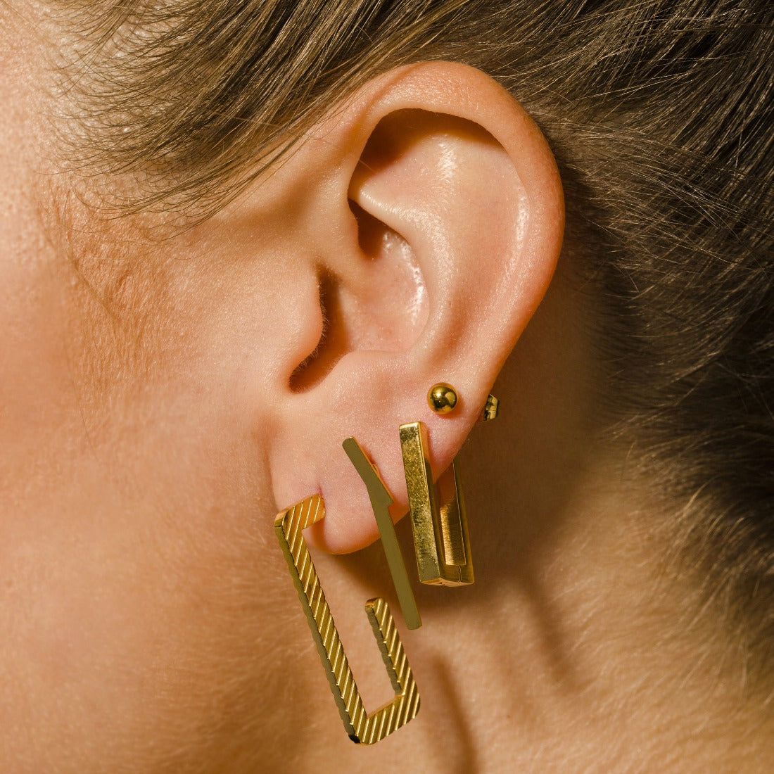 Style DELILAH: Rectangular Mini Hoop Earrings in Gold - Velora Luxury Fashion