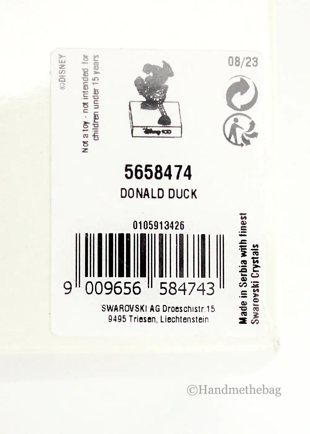 Swarovski Disney100 Donald Duck Iridescent Figurine - Velora Luxury Fashion