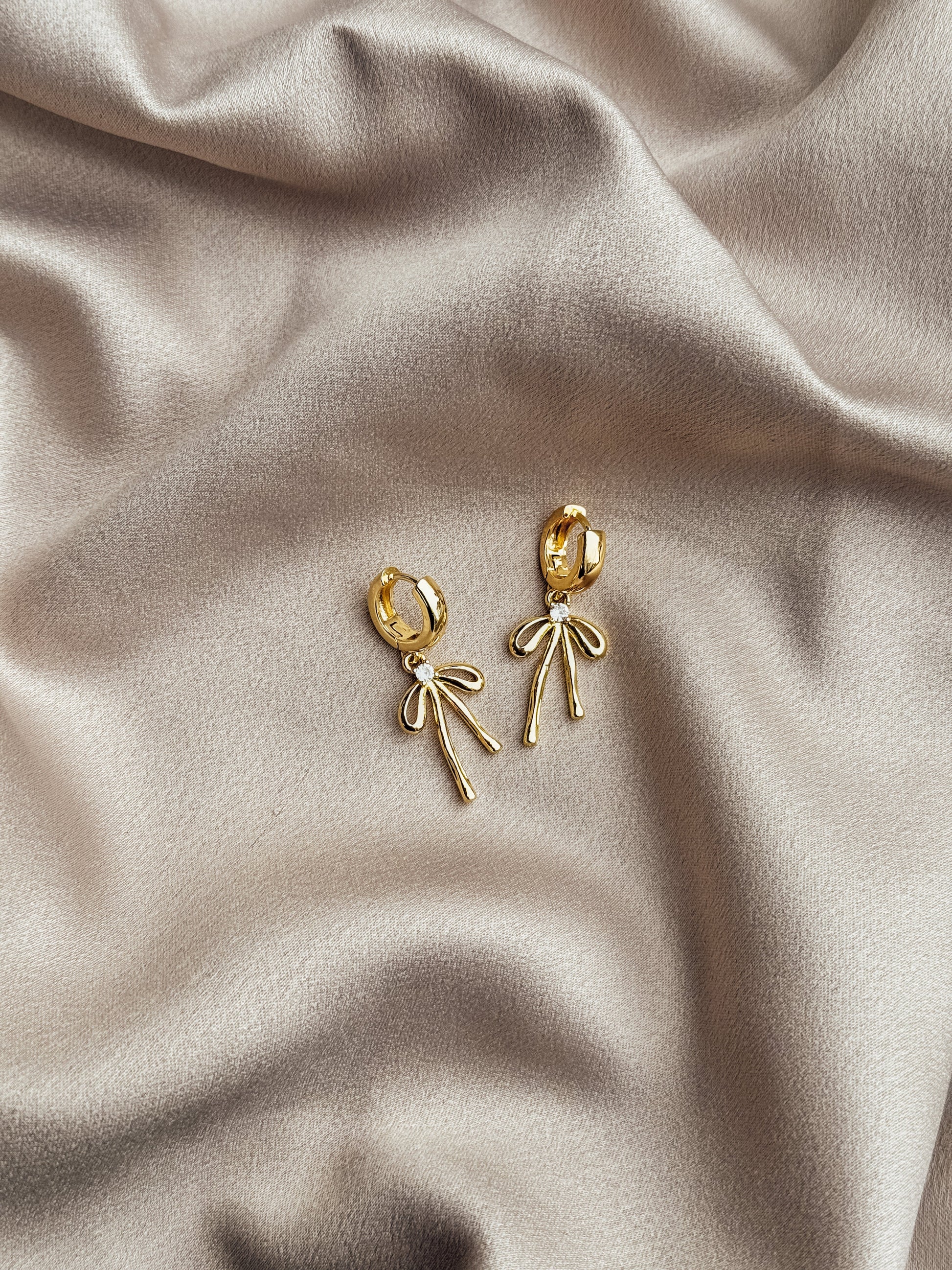 The Poppy Bow Huggies - Velora Luxury Fashion