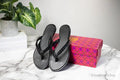 Tory Burch Everly Black Leather Chain Flip Flop Sandals - Velora Luxury Fashion