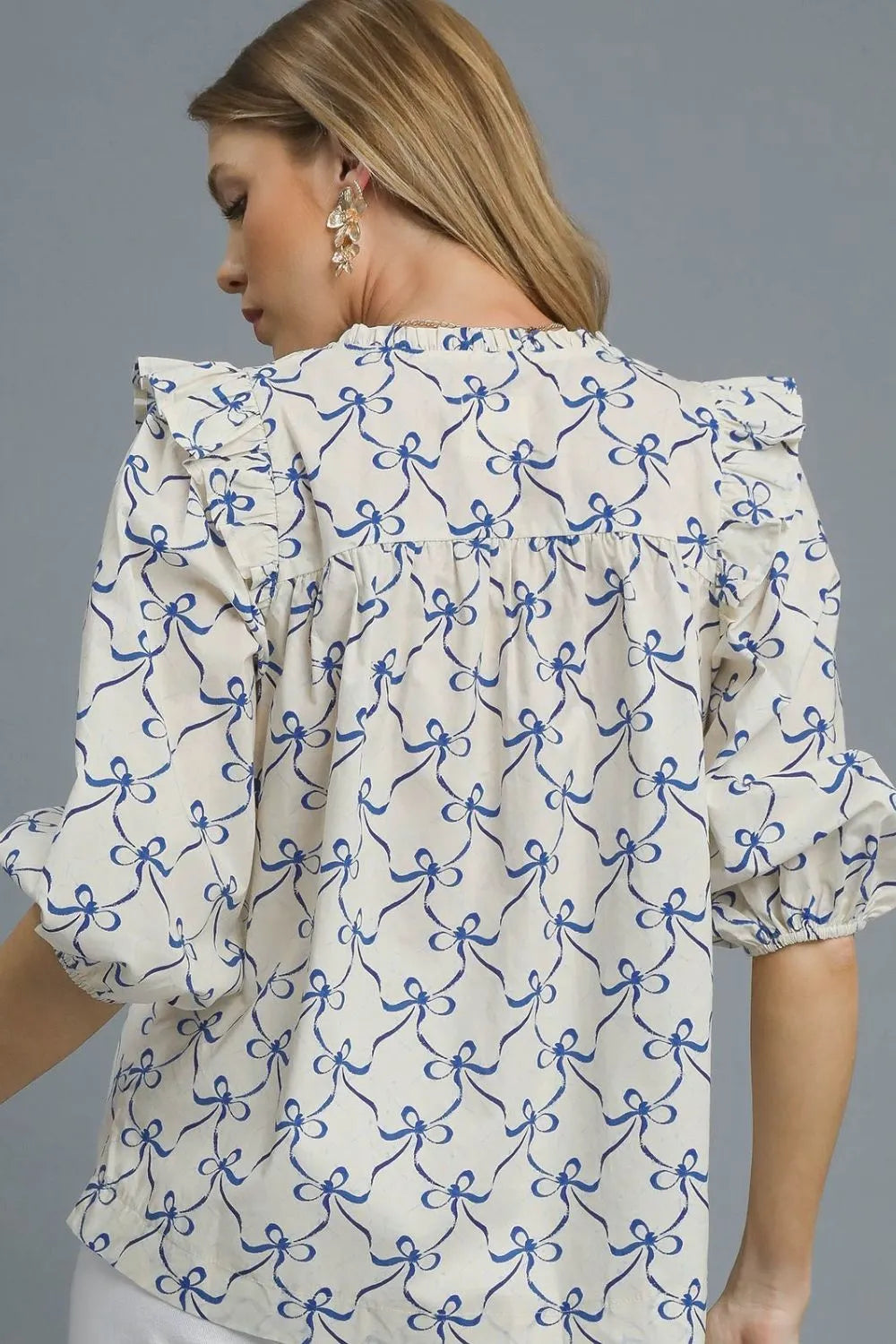 Umgee Ruffled Bow Print Notched Blouse - Velora Luxury Fashion