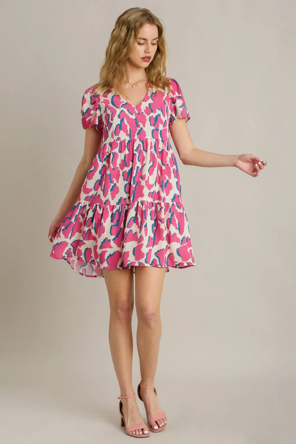 Umgee Full Size Abstract Print Pleat Detail Short Sleeve V-Neck Tiered Dress Plus Size - Velora